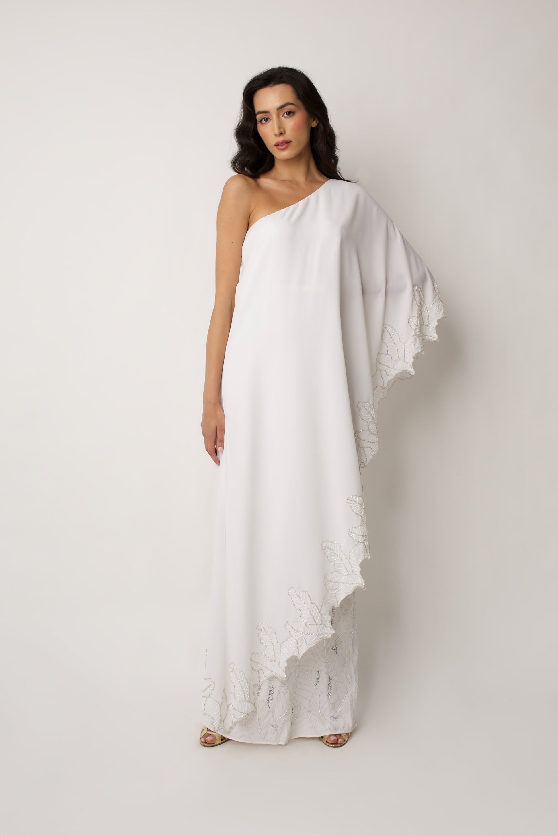 bridal dress with a waterfall-like drape sleeve 