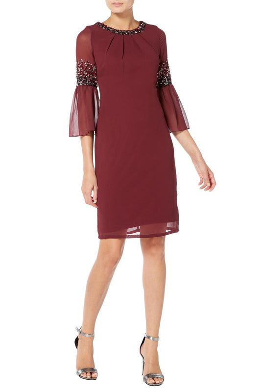 wine coloured midi dress with embellishment at the neckline and arms.